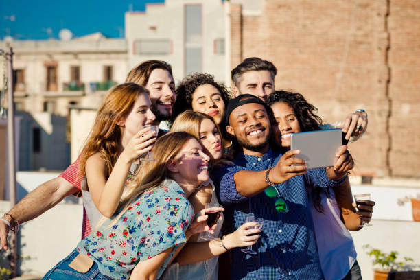 istock Happy friends taking selfie outdoor 664202996
