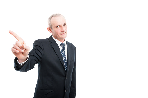 Middle aged elegant man showing index finger like a denial wearing suit and tie isolated on white background with copy text space
