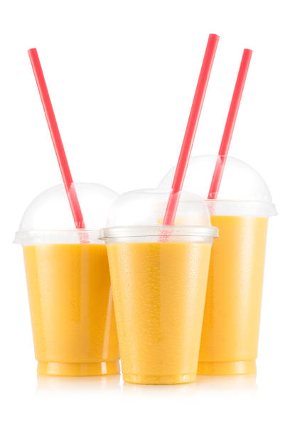 istock Yellow fruit smoothie in three size of plastic cup 664209598