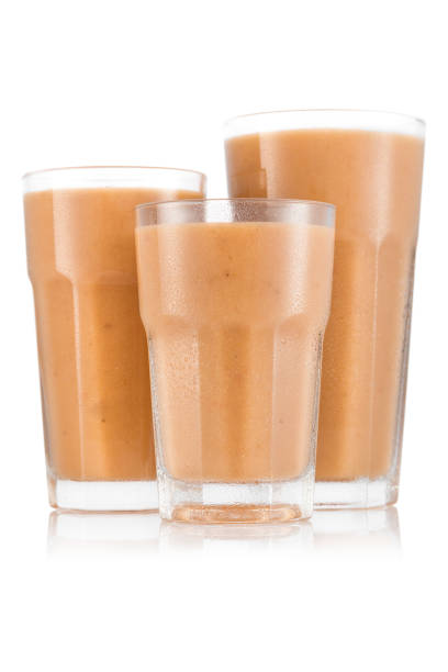 istock Yellow fruit smoothie in three size of glass 664209602
