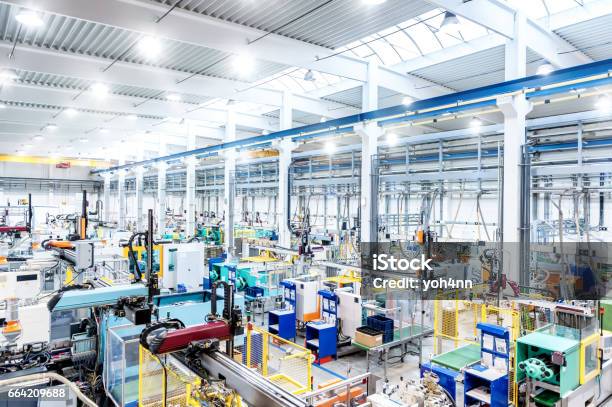 Factory Interior Futuristic Machines Stock Photo - Download Image Now - Manufacturing, Factory, Lighting Equipment