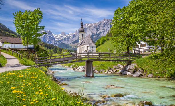 Church of Ramsau, Berchtesgadener Land, Bavaria, Germany Scenic mountain landscape in the Bavarian Alps with famous Parish Church of St. Sebastian in the village of Ramsau in springtime, Nationalpark Berchtesgadener Land, Upper Bavaria, Germany bavarian forest stock pictures, royalty-free photos & images