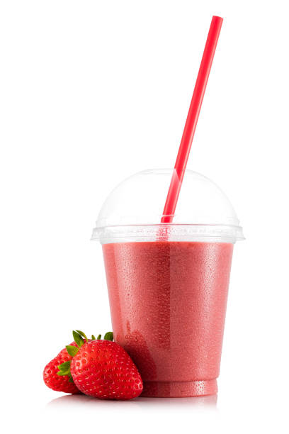 istock Strawberry smoothie in plastic cup with fruit 664210502