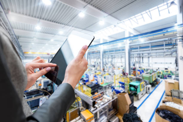 istock Manager in the factory & digital tablet 664213120
