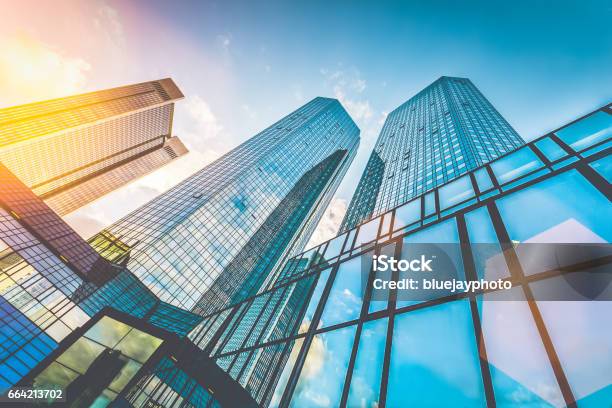 Modern Skyscrapers In Business District At Sunset With Lens Flare Effect Stock Photo - Download Image Now