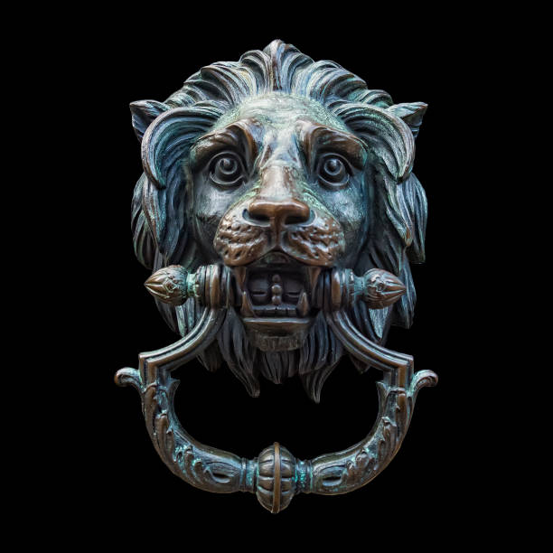 istock Metal Lion Head DoorKnocker Isolated Black 664218978