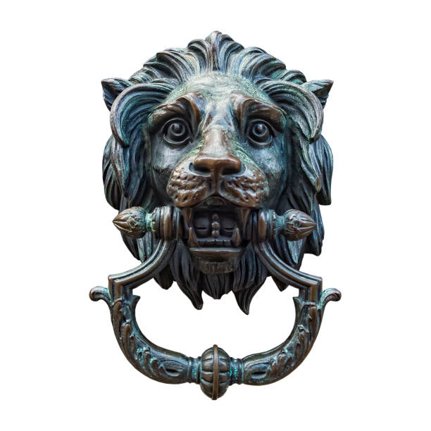 istock Metal Lion Head DoorKnocker Isolated White 664218984