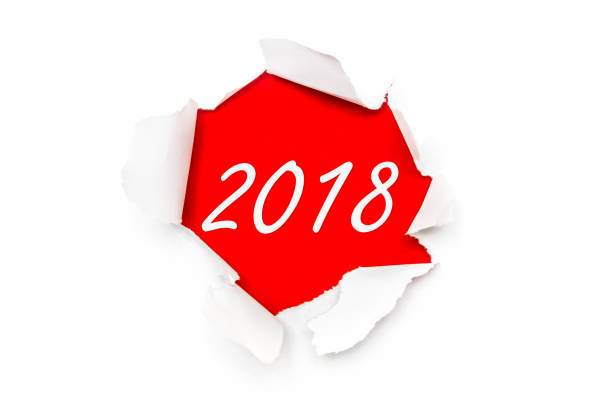 istock Torn paper with written words New Year 2018 664222152