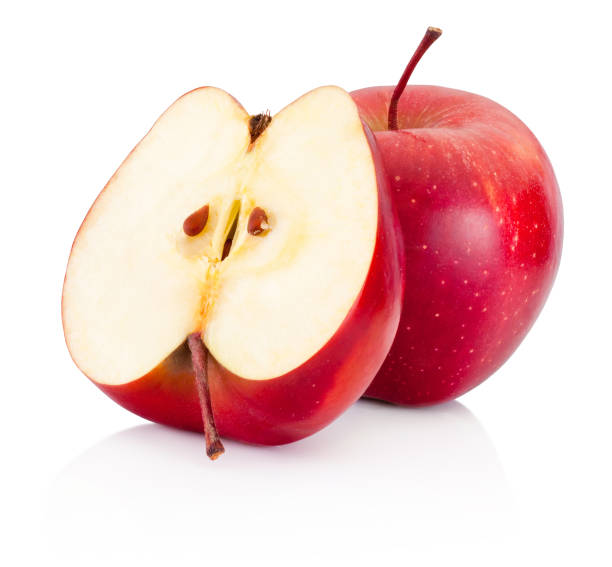 istock One and a half red apples isolated white background 664229646