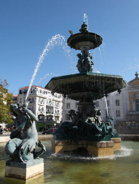 istock Fountain in Dom Pedro IV Square, Lisbon 664230026