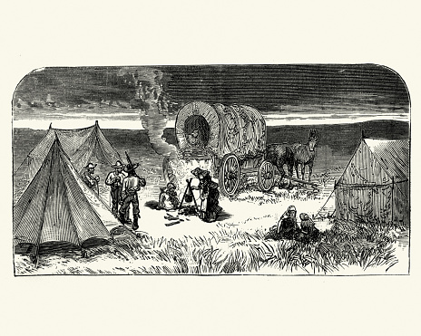 Vintage engraving of a Wild West Cowboy pioneer camp and wagon