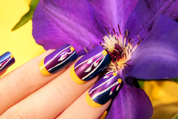 istock Summer lilac yellow nail design. 664234010