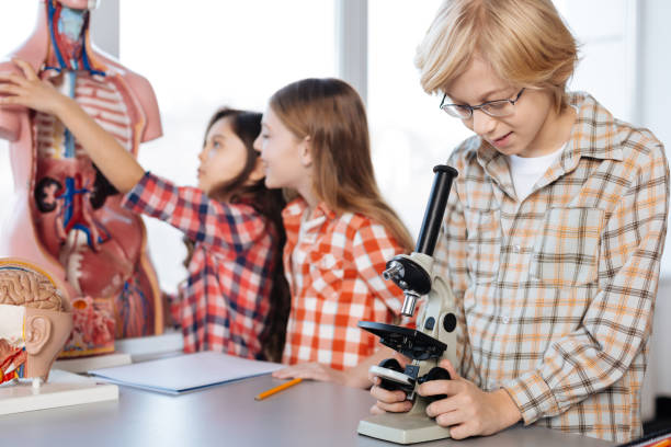 istock Lively energetic students enjoying their time in laboratory 664234930