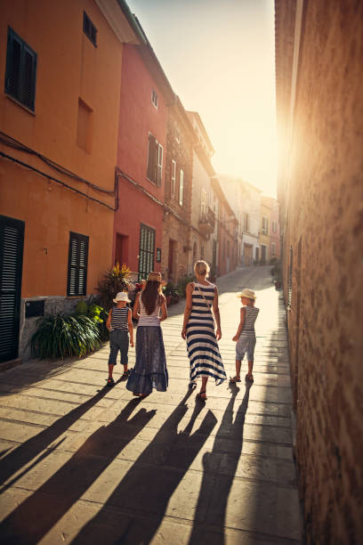 istock Family visiting mediterranean town. 664238978