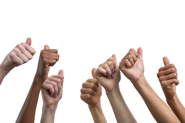 istock Multiethnic women showing their thumbs up 664241550