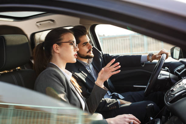istock Two business friends in the car. 664242236