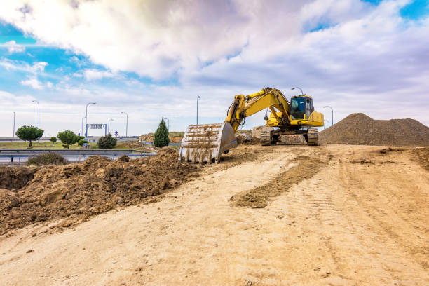 Open-air mine with heavy machinery, excavators for earth and rock movement