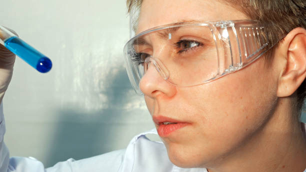 istock Doctor scientist looking at the test tubes in lab 664246616