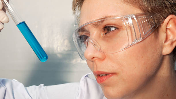 istock Doctor scientist looking at the test tubes in lab 664246636