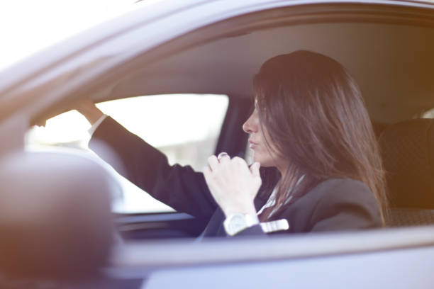 istock Young woman driving 664253648