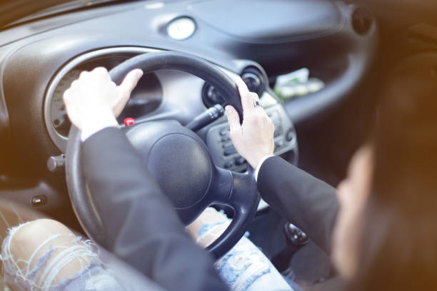 istock Young woman driving 664253674
