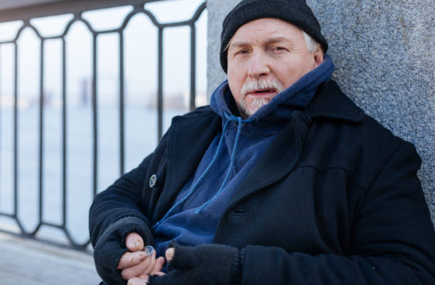 istock Portrait of kind man looking straight at camera 664258354