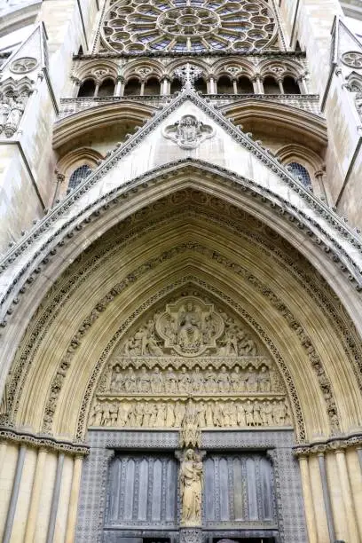 Upwards view Westportal of Westminster Abbey in London, United Kingdom