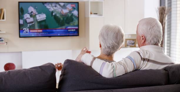 istock Senior couple watching TV 664259304