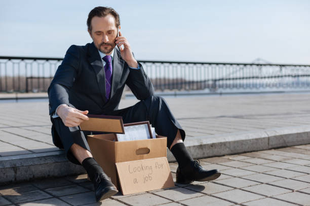 istock Sad man calling to his wife 664262230