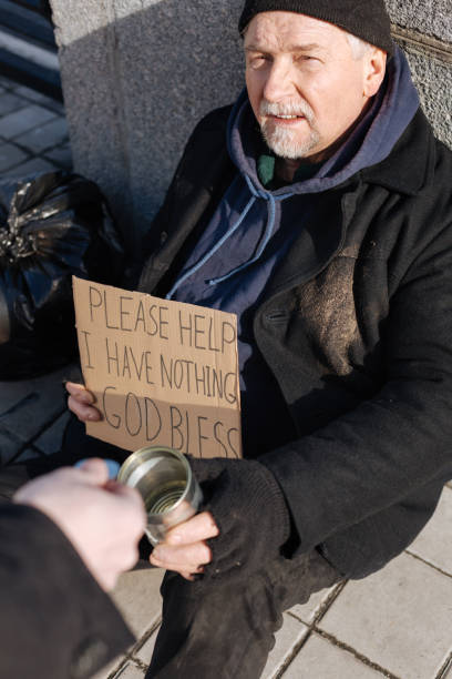 istock Serious poor man wearing untidy clothes 664262786