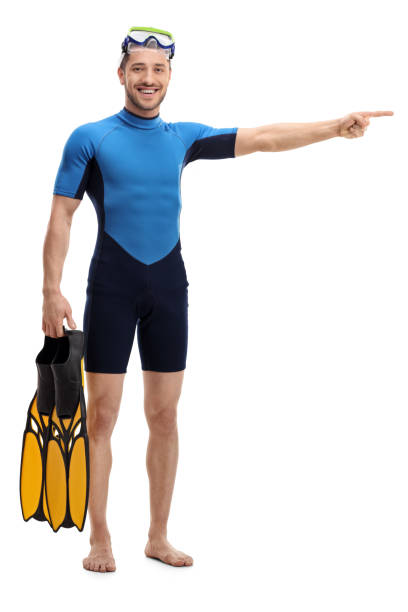 istock Man in a wetsuit with snorkeling equipment pointing right 664266198