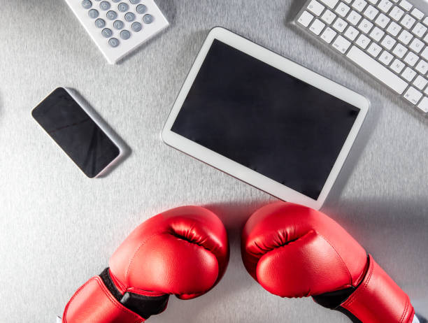 istock businessman hands waiting with boxing gloves facing difficult communication 664270278