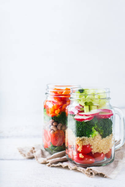 istock Healthy vegan salad in a mason jar with quinoa 664272084
