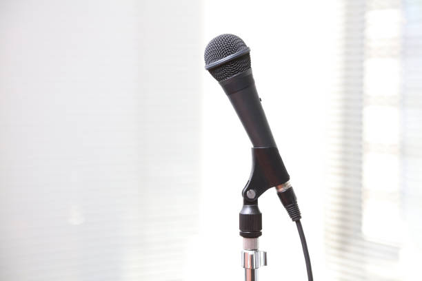 istock Close up old microphone in conference room 664277494