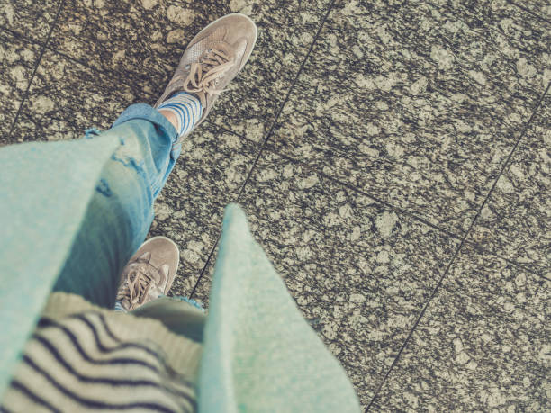 The girl walks the marble floor