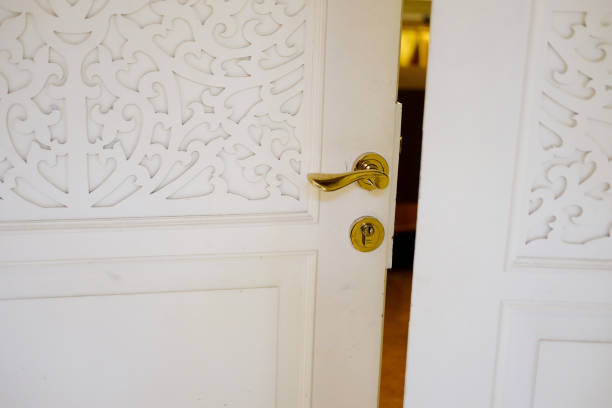 istock Opened white door to meeting in office 664287600