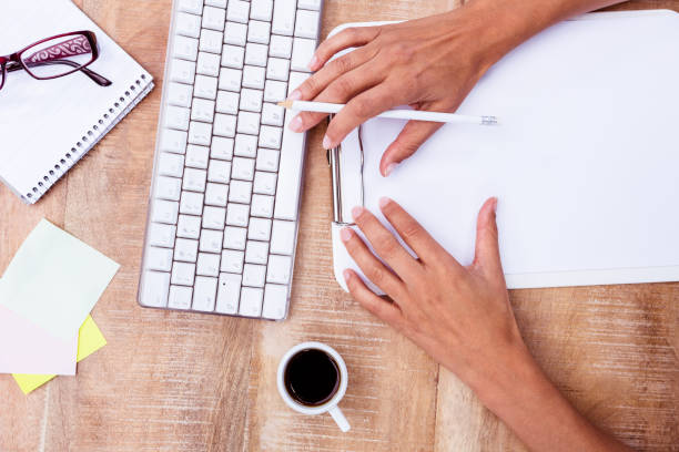 istock Businesswoman holding pen 664291792