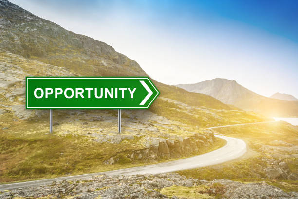 istock opportunity words on green road sign 664291960