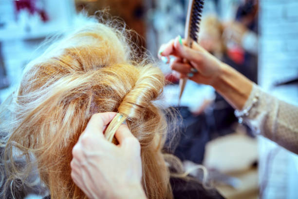 istock Hair styling in a beauty salon . 664297044
