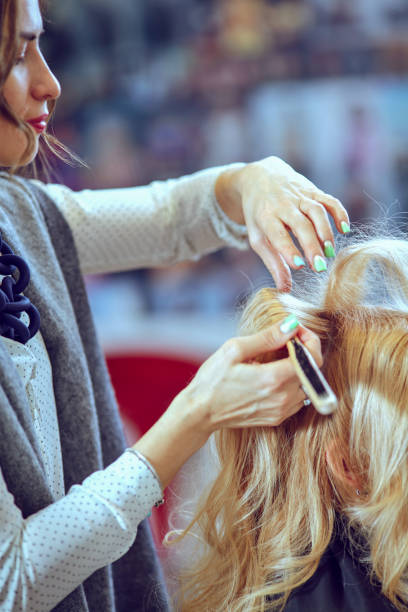 istock Hair styling in a beauty salon . 664297058