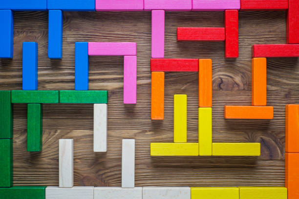 istock Colorful maze on brown background. 664300154