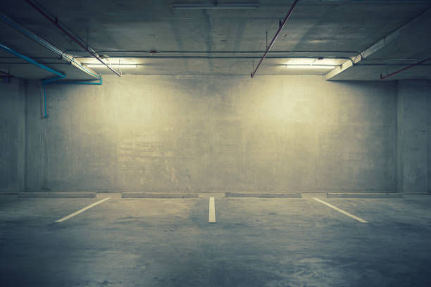 istock Parking garage department store interior with blank billboard 664309364