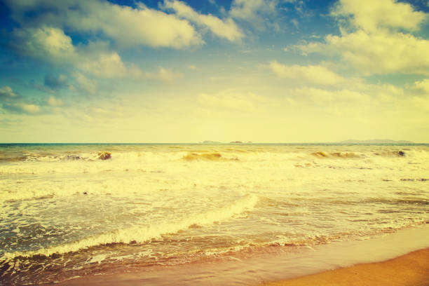 Sea beach and blue wave in summer with vinatge effect.