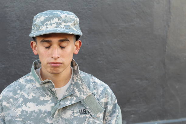 istock Young army soldier crying close up 664316814