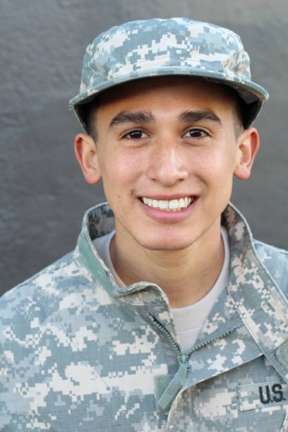 istock Proud army soldier smiling close up 664316984