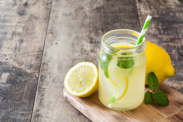 istock Lemonade drink in a jar glass 664325306
