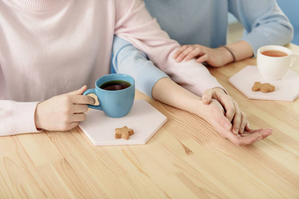 istock Lesbian girls resting together indoors 664328426