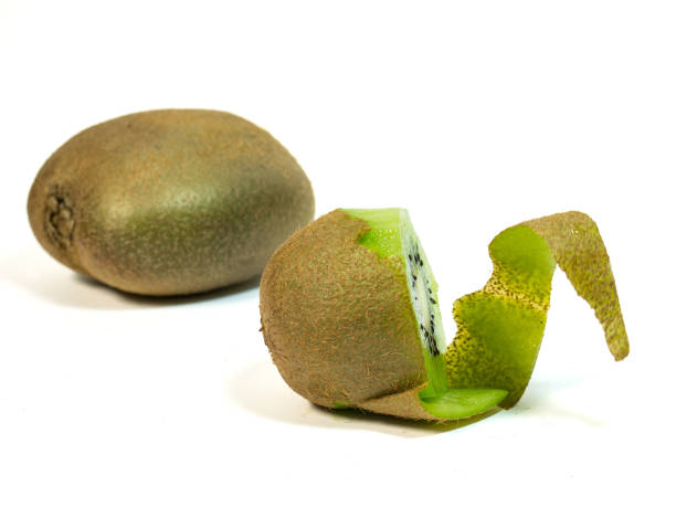 istock Peeled Kiwi Fruit isolated on White Background 664328836