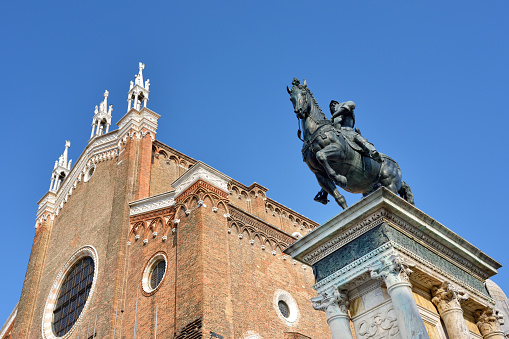 The equestrian statue (1488) of Bartolomeo Colleoni by Verrocchio in Venice. Campo Santi Giovanni e Paolo a Venezia opposite La Scuola Grande di San Marco.  An Italian condottiero, who became captain-general of the Republic of Venice