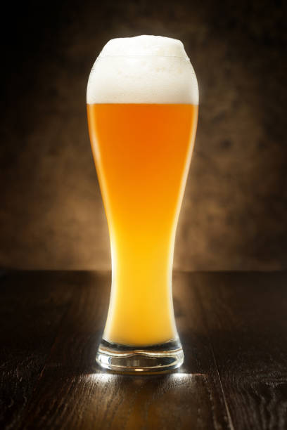 istock beer glass on a wooden table 664337026